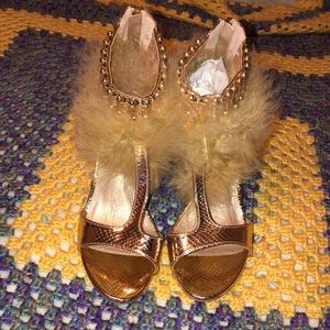 Rose gold fux fur peep toe shoes.